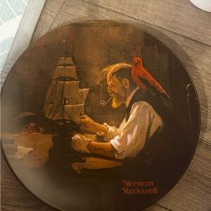 Norman Rockwell Heritage Collection Plate with Cream and Red Accents 15$ apiece